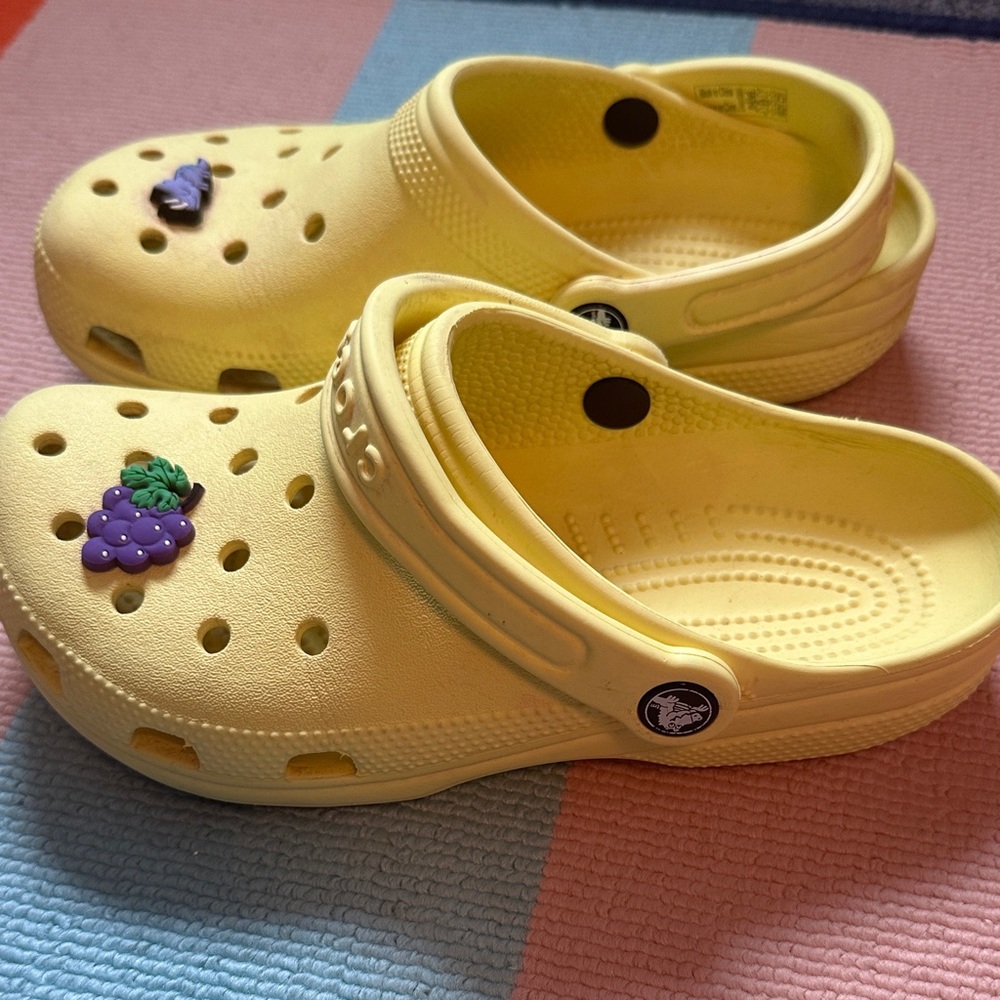 Yellow Crocs Clogs with grape and rhino giblets
